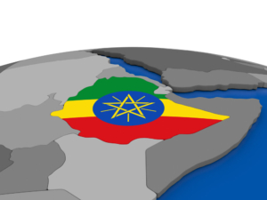Le drapeau de l'Éthiopie sur un globe terrestre.
